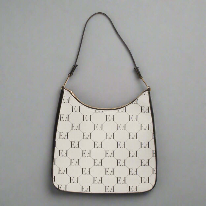 Handbag with a patterned design on a white background