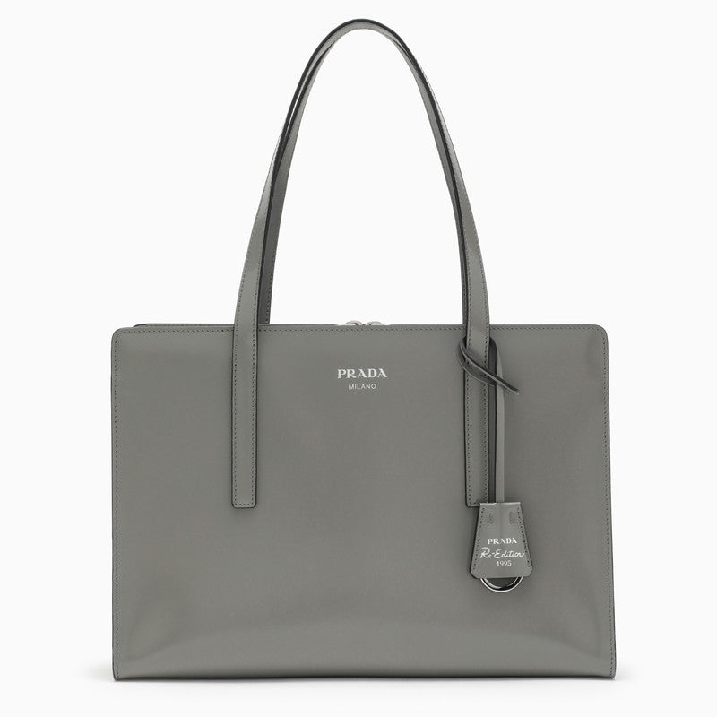 Gray Prada handbag on a white background