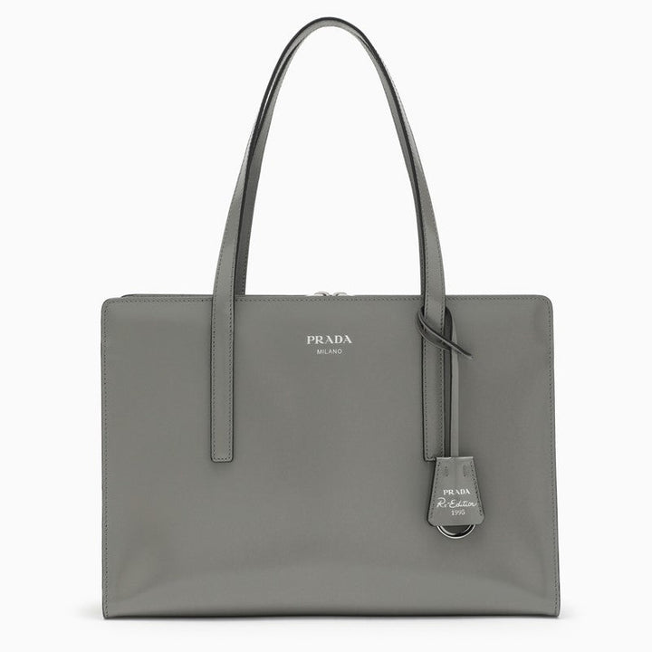 Gray Prada handbag on a white background