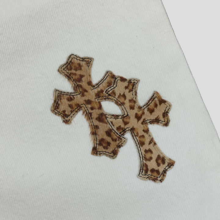 Chrome Hearts Levis Cross Patch Jeans in White / Leopard with leopard print cross patch detail.