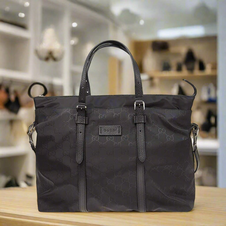 Bolso de mano unisex GUCCI de piel y tejido negro Guccissima