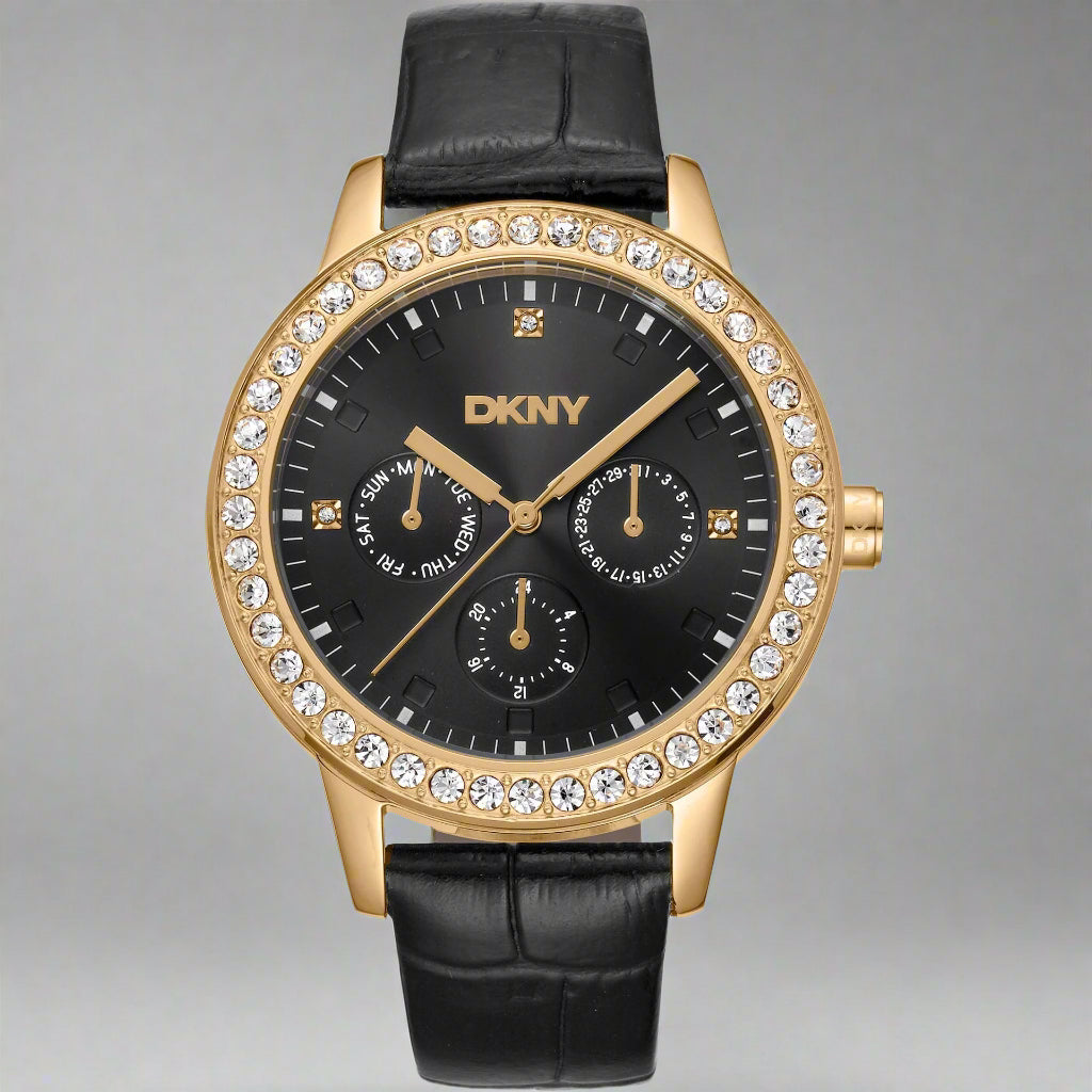 DKNY women's black dial jeweled bezeled Watches