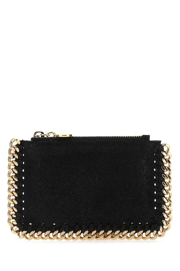 Black pouch with gold chain on a white background
