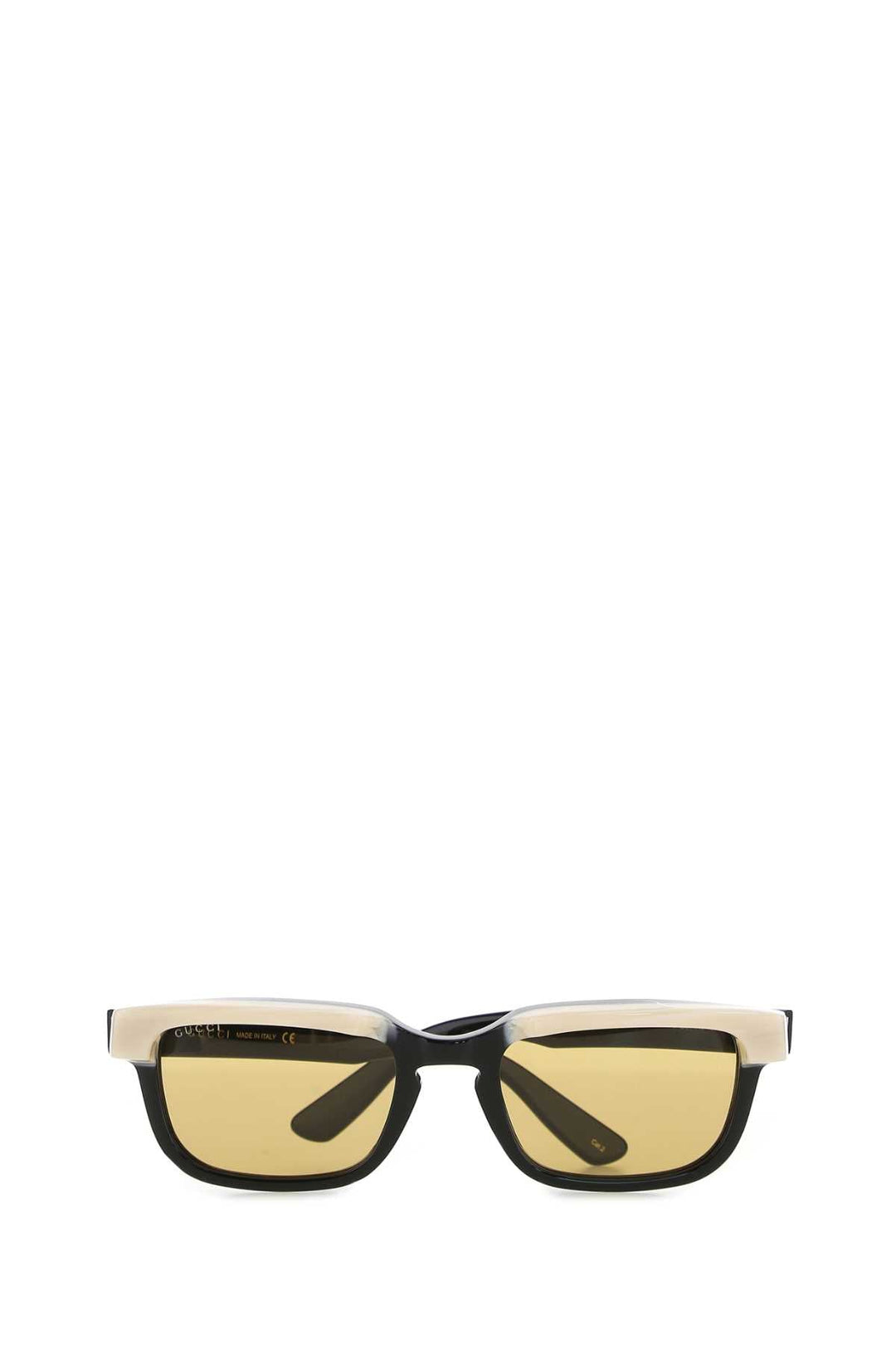 Sunglasses with a black frame and yellow-tinted lenses on a white background