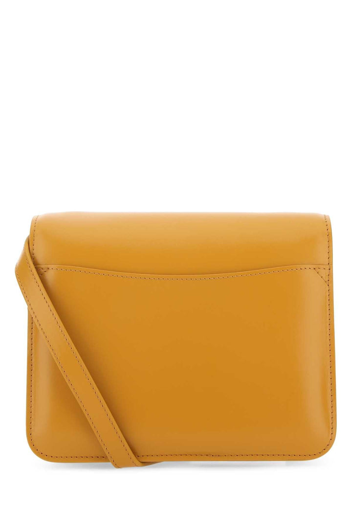 Yellow crossbody bag on a white background