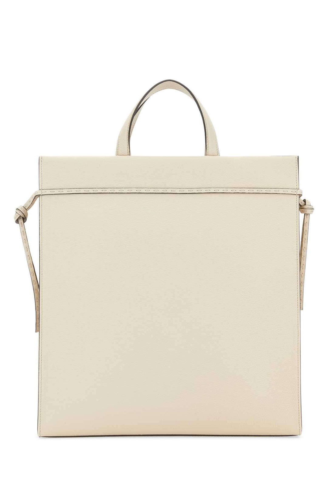 Beige handbag with a strap on a white background
