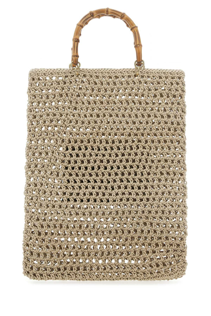 Beige woven tote bag with bamboo handle on a white background
