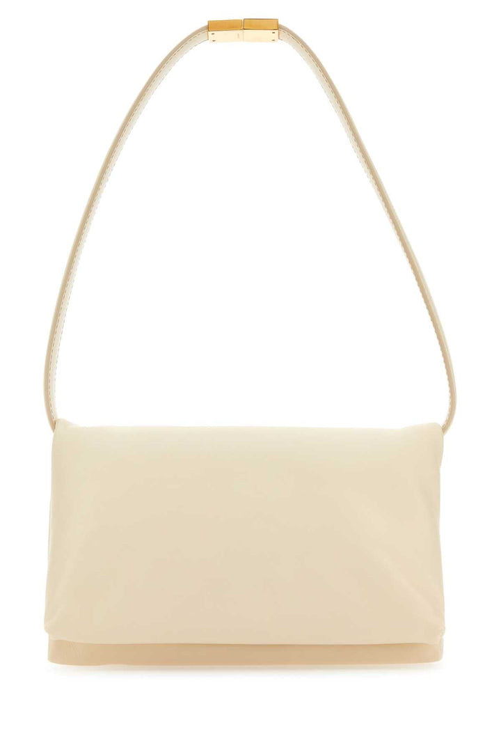 Beige handbag with a strap on a white background