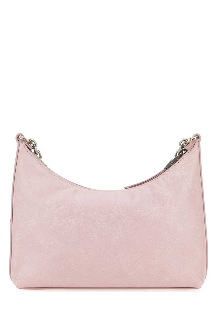 Pink handbag with chain detail on a white background