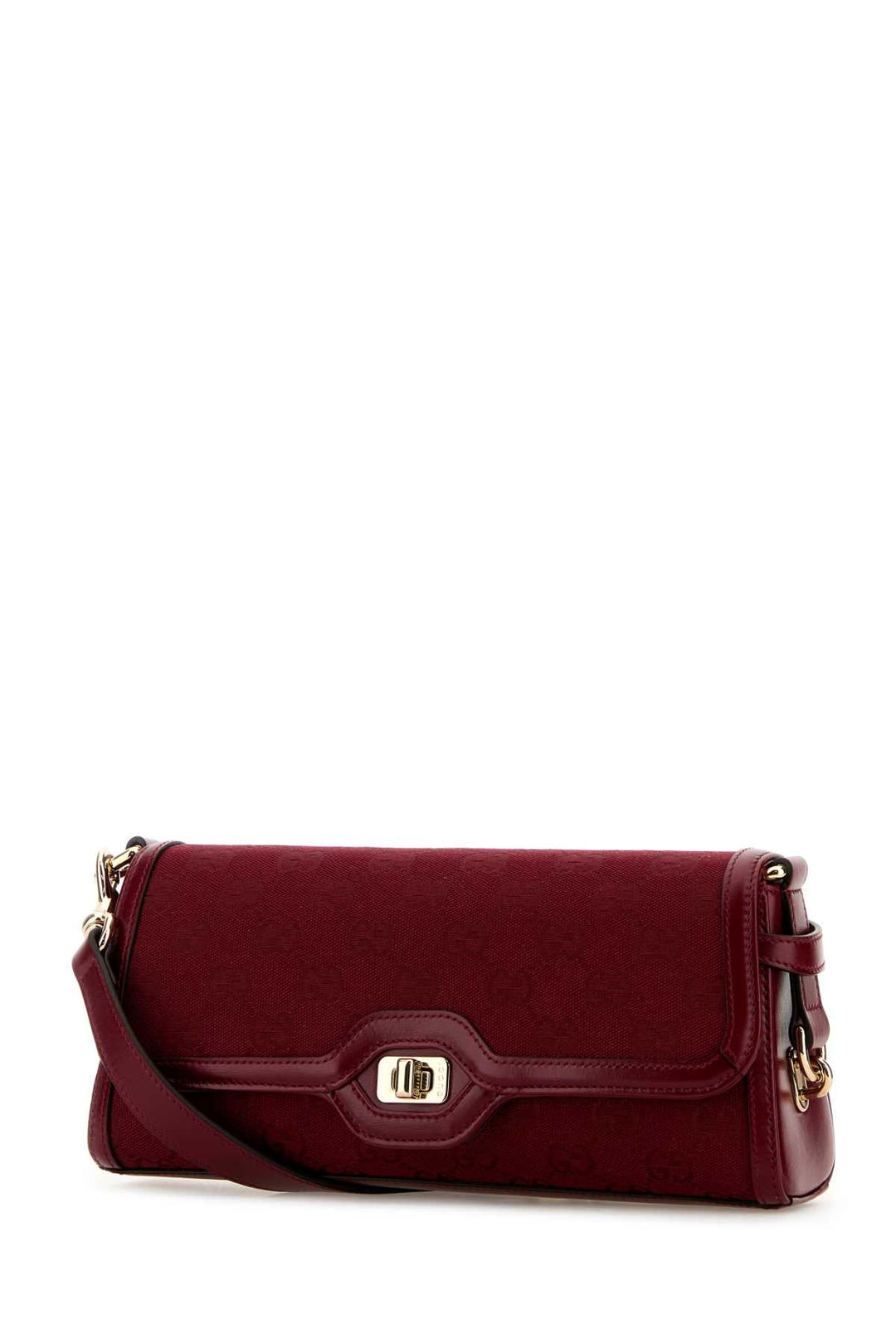 Red handbag with gold accents on a white background