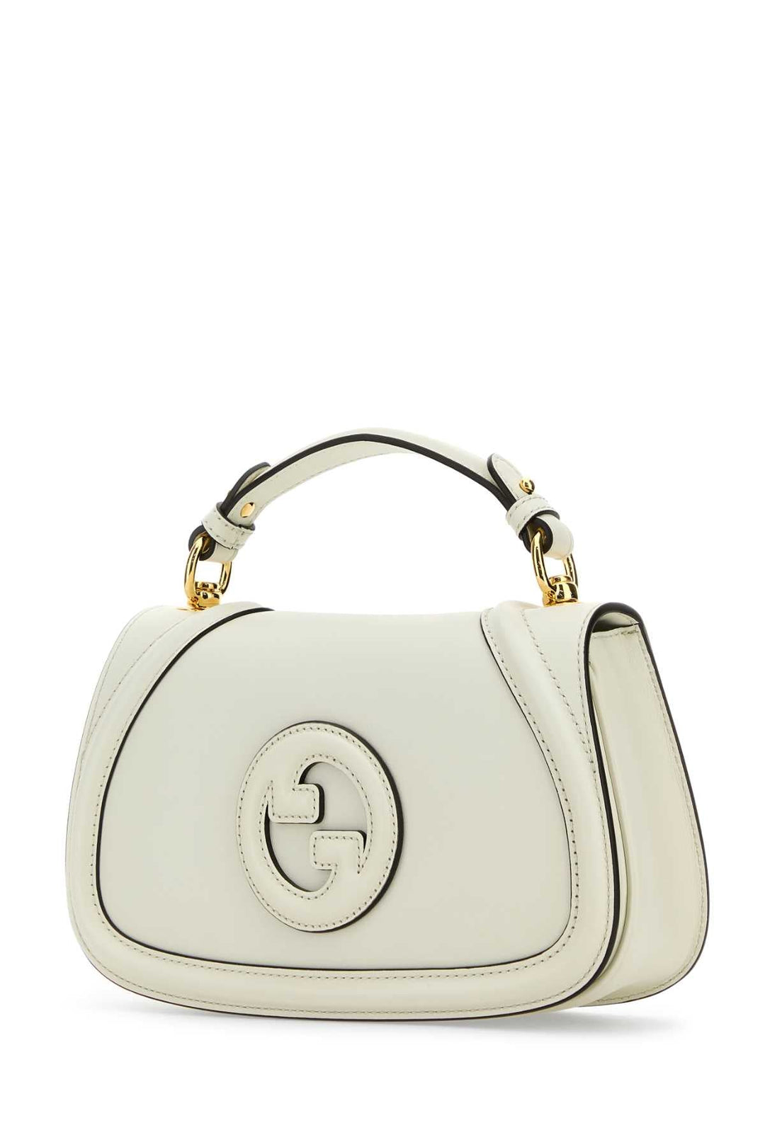 White handbag with gold accents on a white background