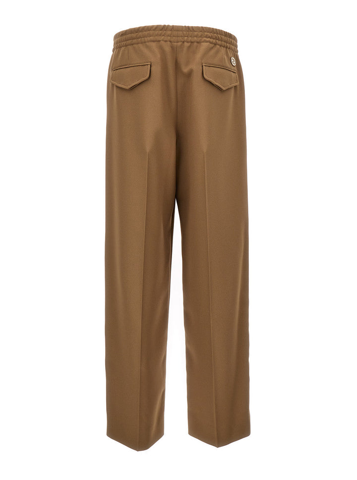 Gucci Men Beige Tapered Leg Trousers In Technical Fabric Man