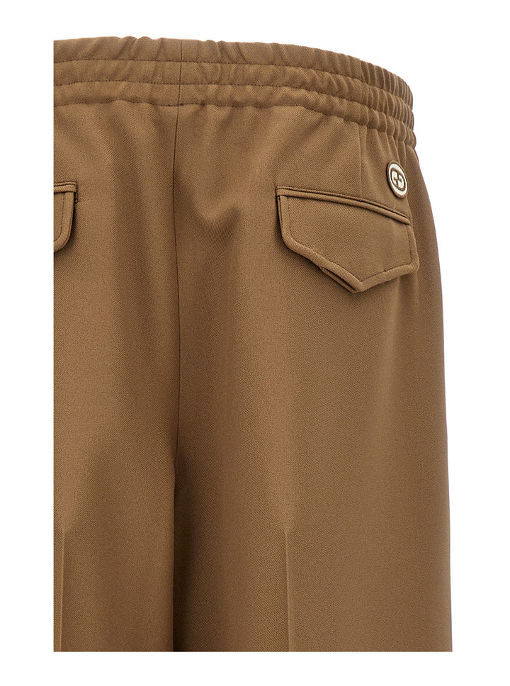 Gucci Men Beige Tapered Leg Trousers In Technical Fabric Man