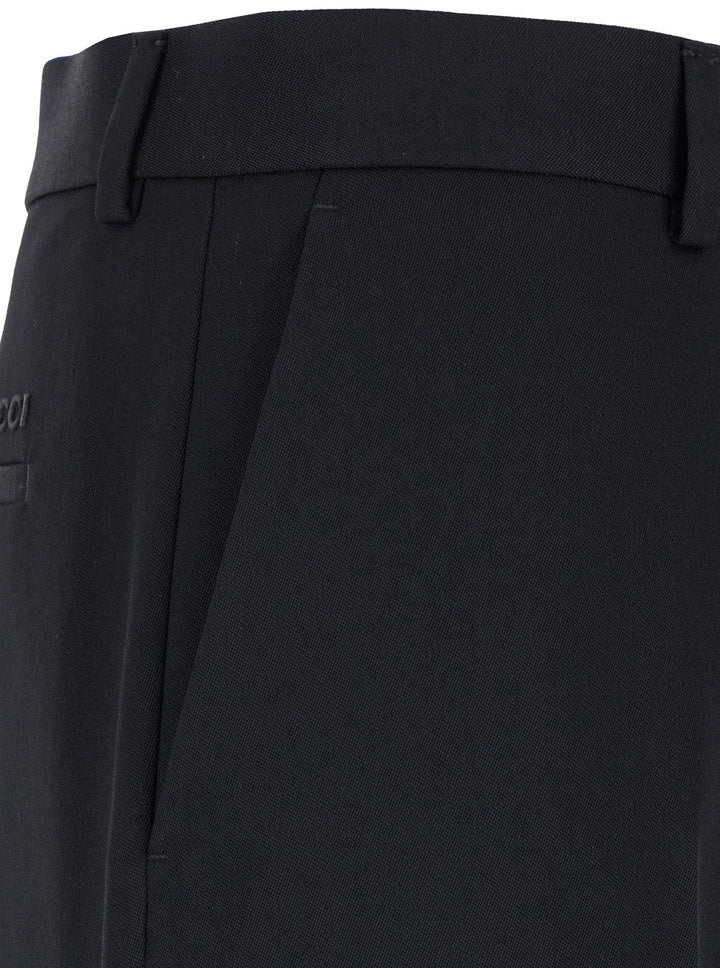 Gucci Men Black Straight Pants With Tonal Logo Lettering In Wool Man