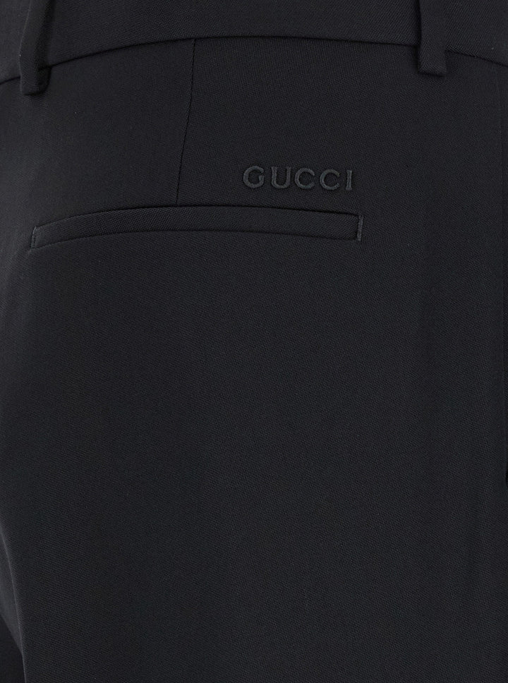 Gucci Men Black Straight Pants With Tonal Logo Lettering In Wool Man
