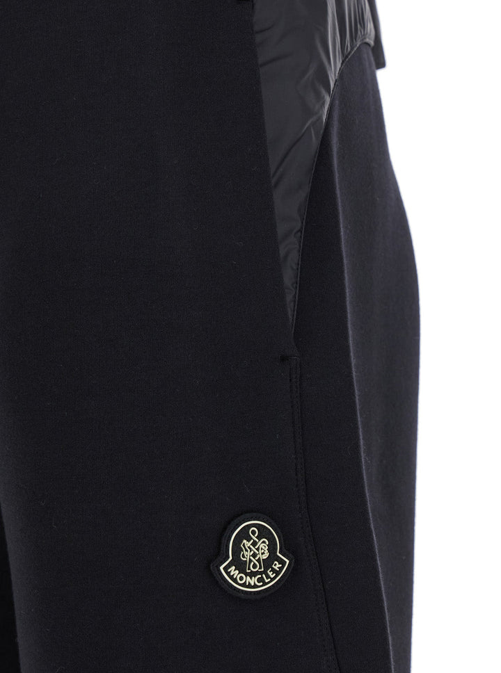 Moncler Men Black Pants With Insert Details And Logo Patch On The Front In Cotton And Tech Fabric Blend Man