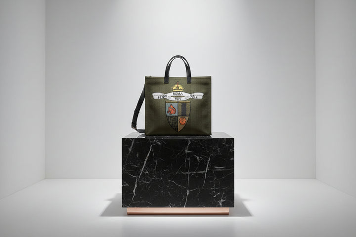 Green tote bag with Fendi logo and branding on a white background