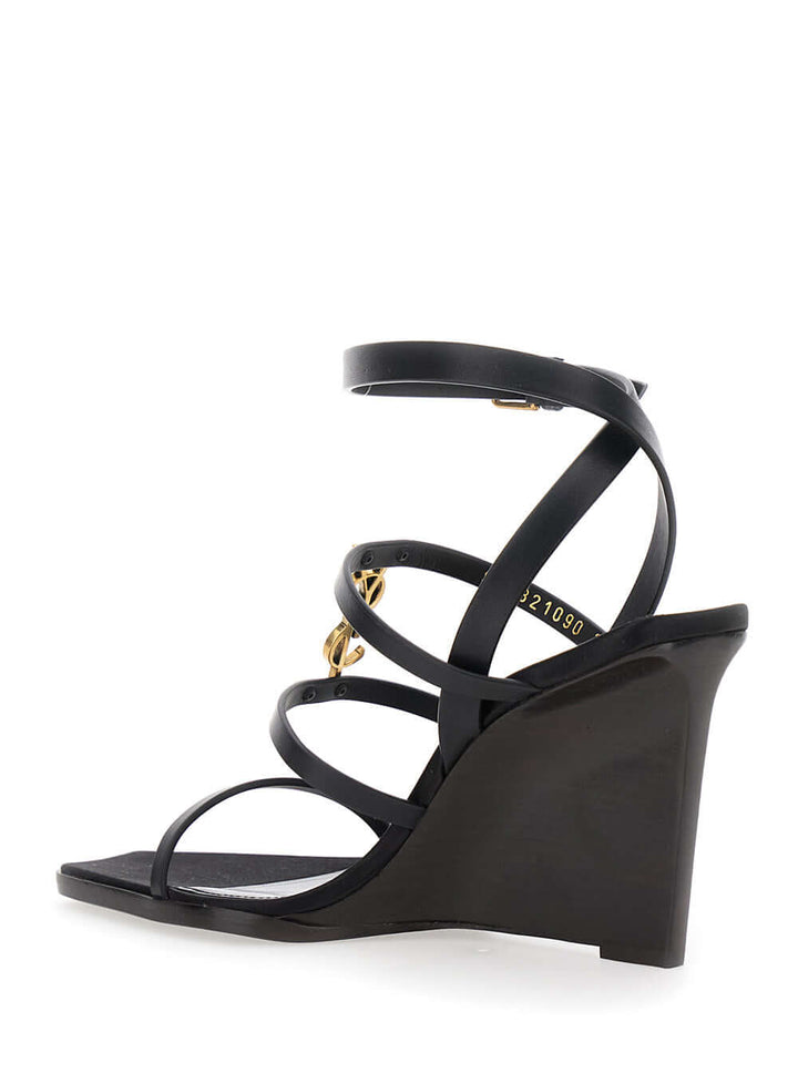 Saint Laurent Women Black Wedges With Metallic Cassandre Detail And Adjustable Leather Strap In Leather Women