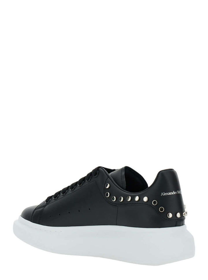 Alexander Mcqueen Men Black Low Top Sneakers With Stud Embellishments In Leather Man