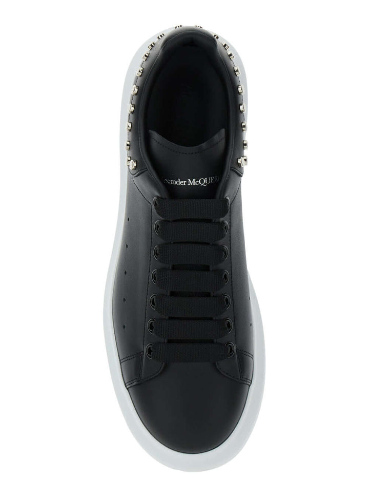 Alexander Mcqueen Men Black Low Top Sneakers With Stud Embellishments In Leather Man