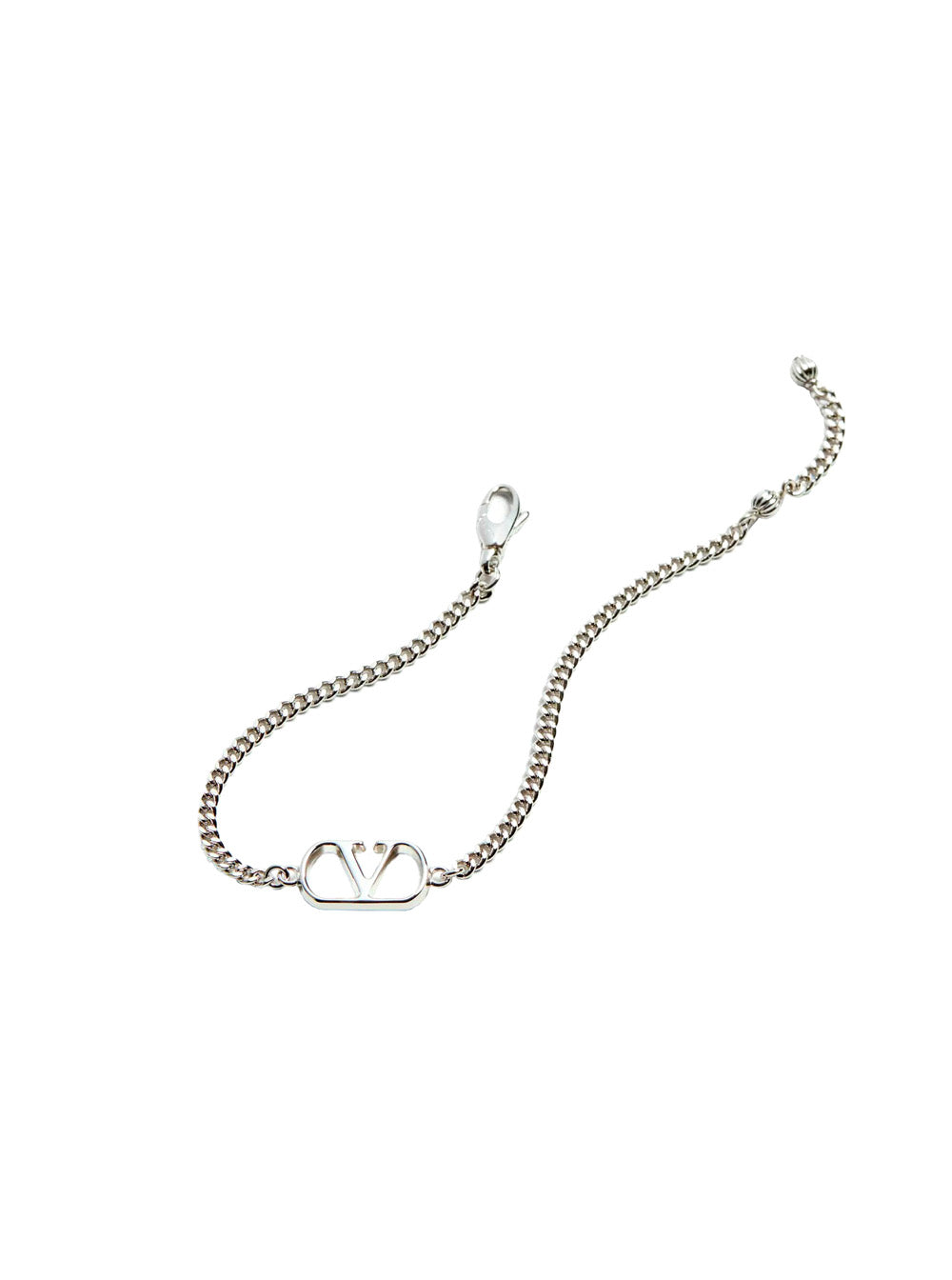 Silver bracelet with a heart-shaped clasp on a white background