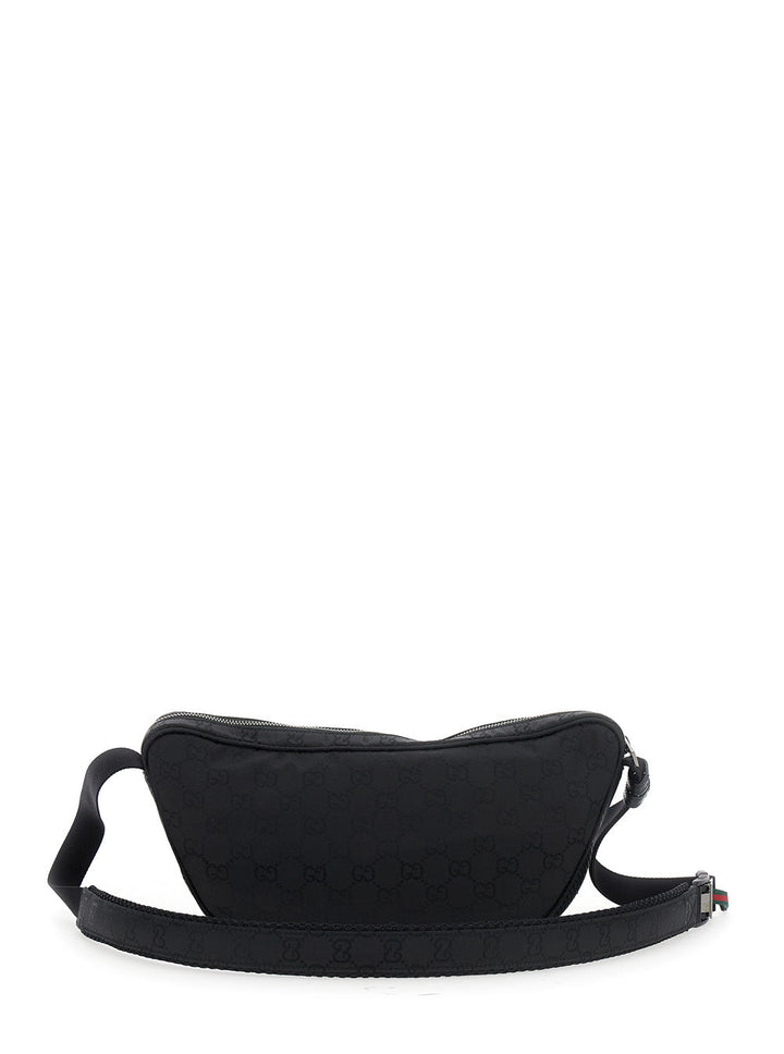Gucci Men Black Pouch With Adjustable Waist Strap And Logo Lettering On The Front In Gg Canvas Man
