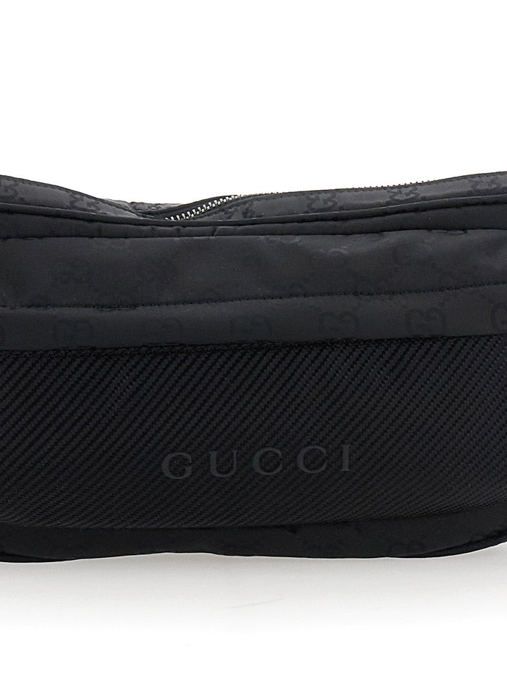 Gucci Men Black Pouch With Adjustable Waist Strap And Logo Lettering On The Front In Gg Canvas Man