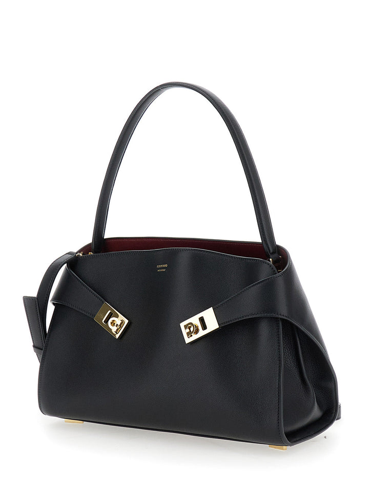 Ferragamo Women 'Hug' Black Shoulder Bag With Logo Print On The Front In Leather Woman