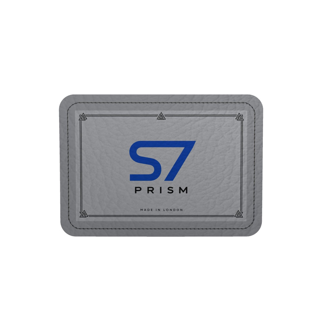 A rectangular gray textured leather patch with rounded corners, featuring a blue &