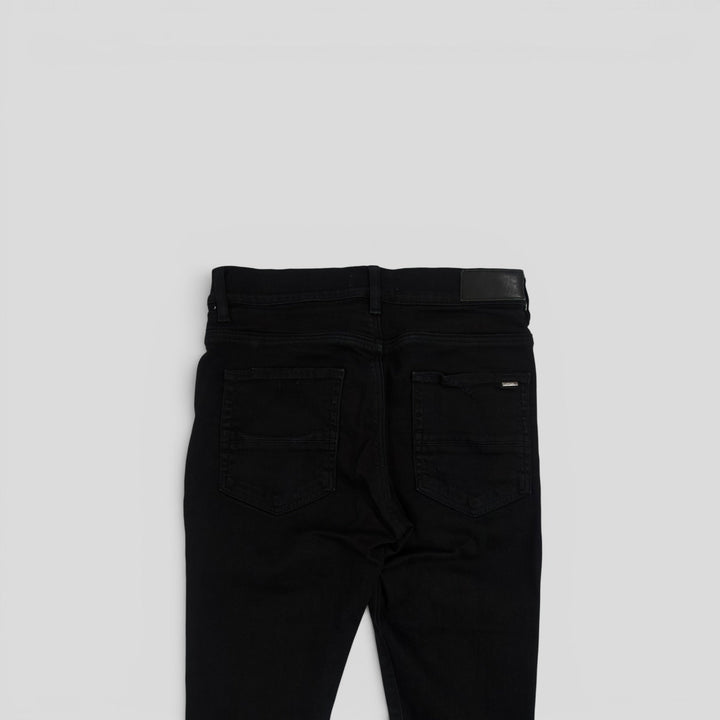 Amiri MX1 Aloha Patch Jeans in Black