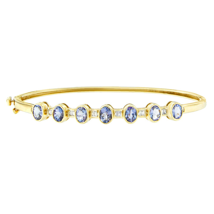 14K Yellow Gold Alternating Bezel Set 5MM Oval Shaped Tanzanite and 1/5 Cttw Diamond Bangle Bracelet (H-I Color, VS2-SI1 Clarity) - Fit's wrists up to 7.25" Inches