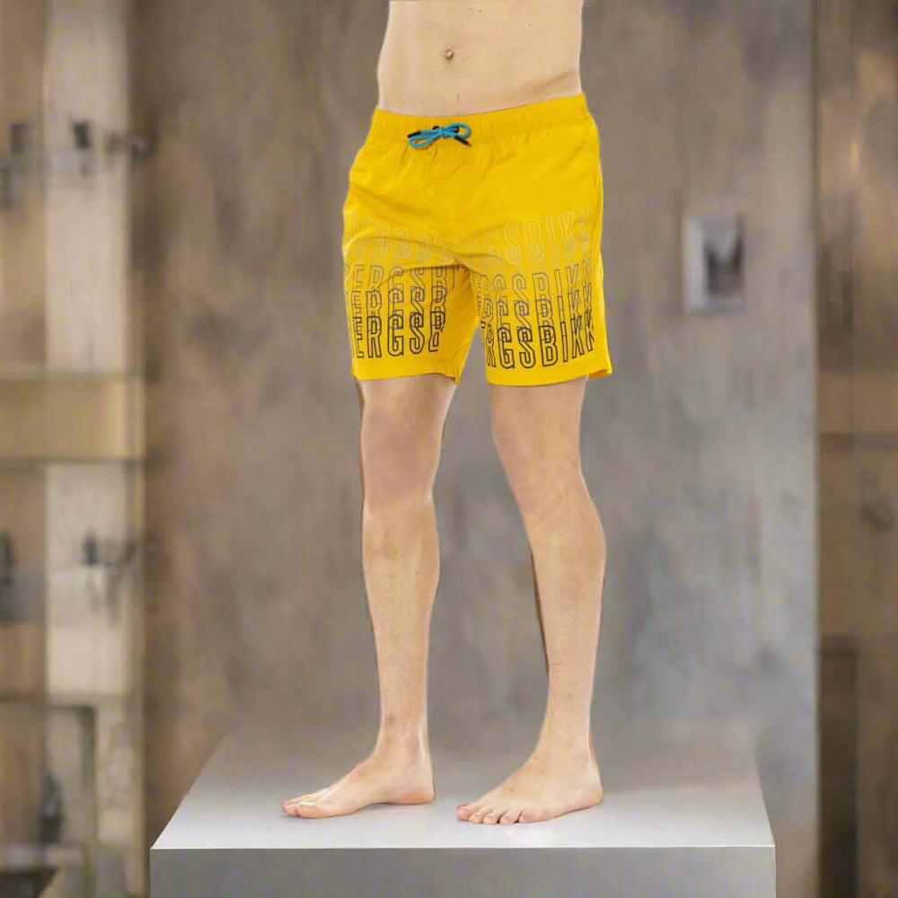 Men’s Bikkembergs beachwear and swimwear collection at STORE 7994 featuring modern swim trunks and sporty beach styles for summer.