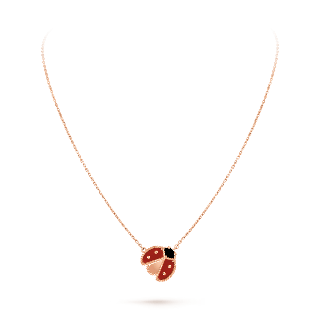 Van Cleef & Arpels Lucky Spring pendant, open wings ladybug 18K rose gold, Carnelian, Onyx on a delicate chain.