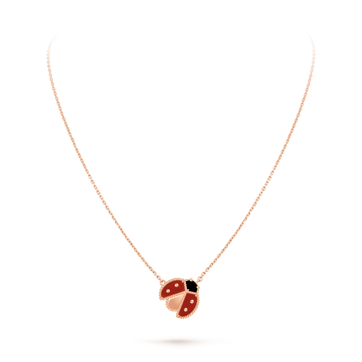 Van Cleef & Arpels Lucky Spring pendant, open wings ladybug 18K rose gold, Carnelian, Onyx on a delicate chain.