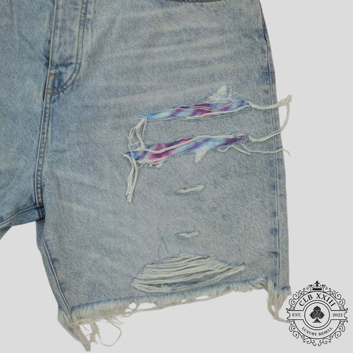 Amiri Tie Dye Thrasher Jean Shorts in Light Wash