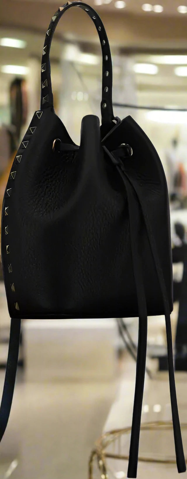 Valentino Garavani women's designer handbag in leather Luxury Valentino Garavani shoulder bag with iconic studs Valentino Garavani crossbody bag in black with gold accents