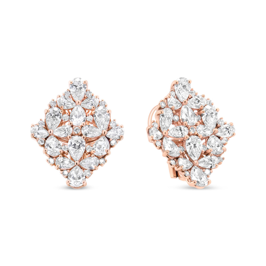Rose gold earrings with clear gemstones on a white background