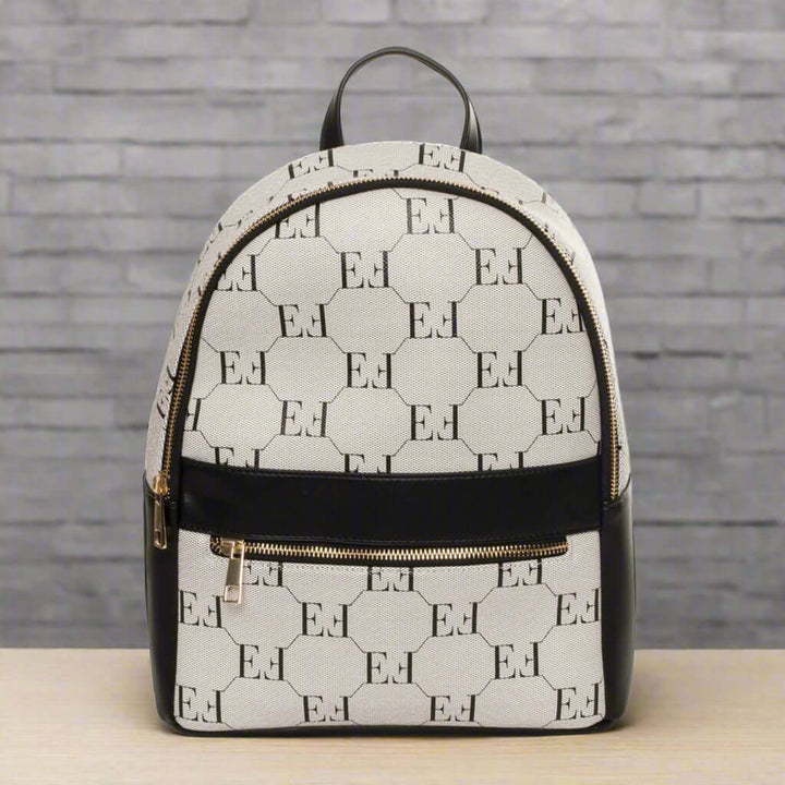 Backpack with monogram pattern on a white background
