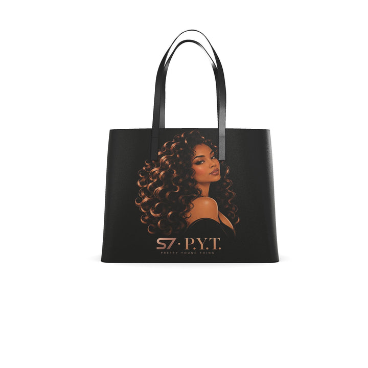 Black S7 P.Y.T. leather tote featuring a copper-toned illustration of a curly-haired woman and rose-gold S7 branding.