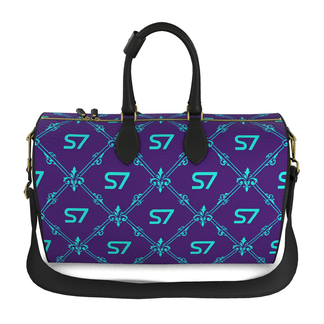 S7 Amethyst Royale purple leather duffle bag with turquoise monograms and ornate diamond lattice, black handles and side panels, and gold-tone hardware.