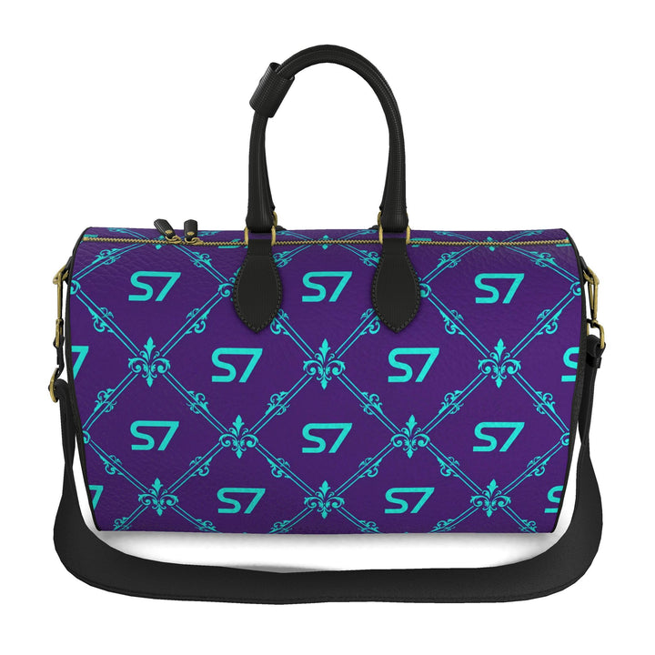 S7 Amethyst Royale purple leather duffle bag with turquoise monograms and ornate diamond lattice, black handles and side panels, and gold-tone hardware.