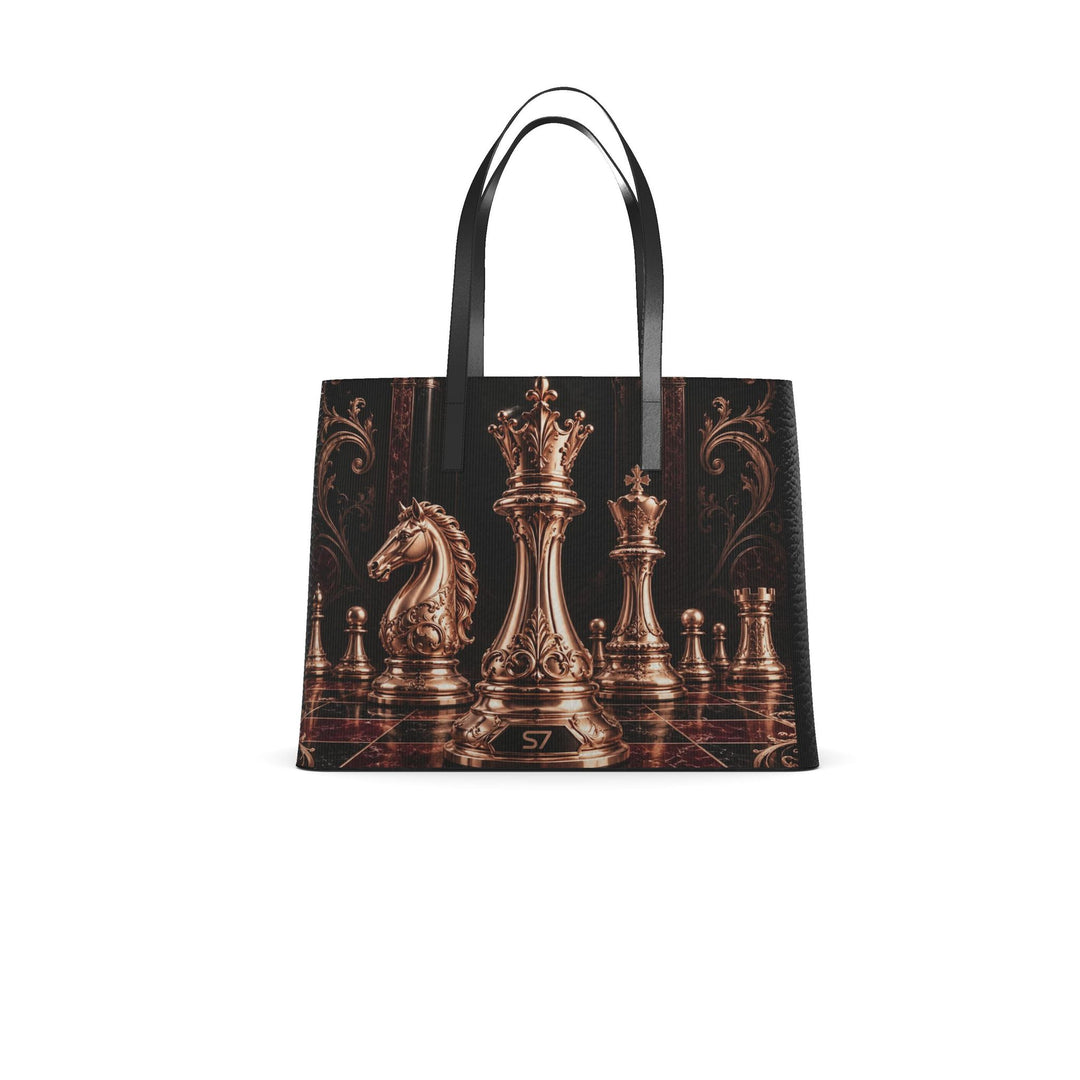 S7 Sovereign black leather tote featuring rose-gold-tone chess pieces, an ornate burgundy chessboard, and black handles.