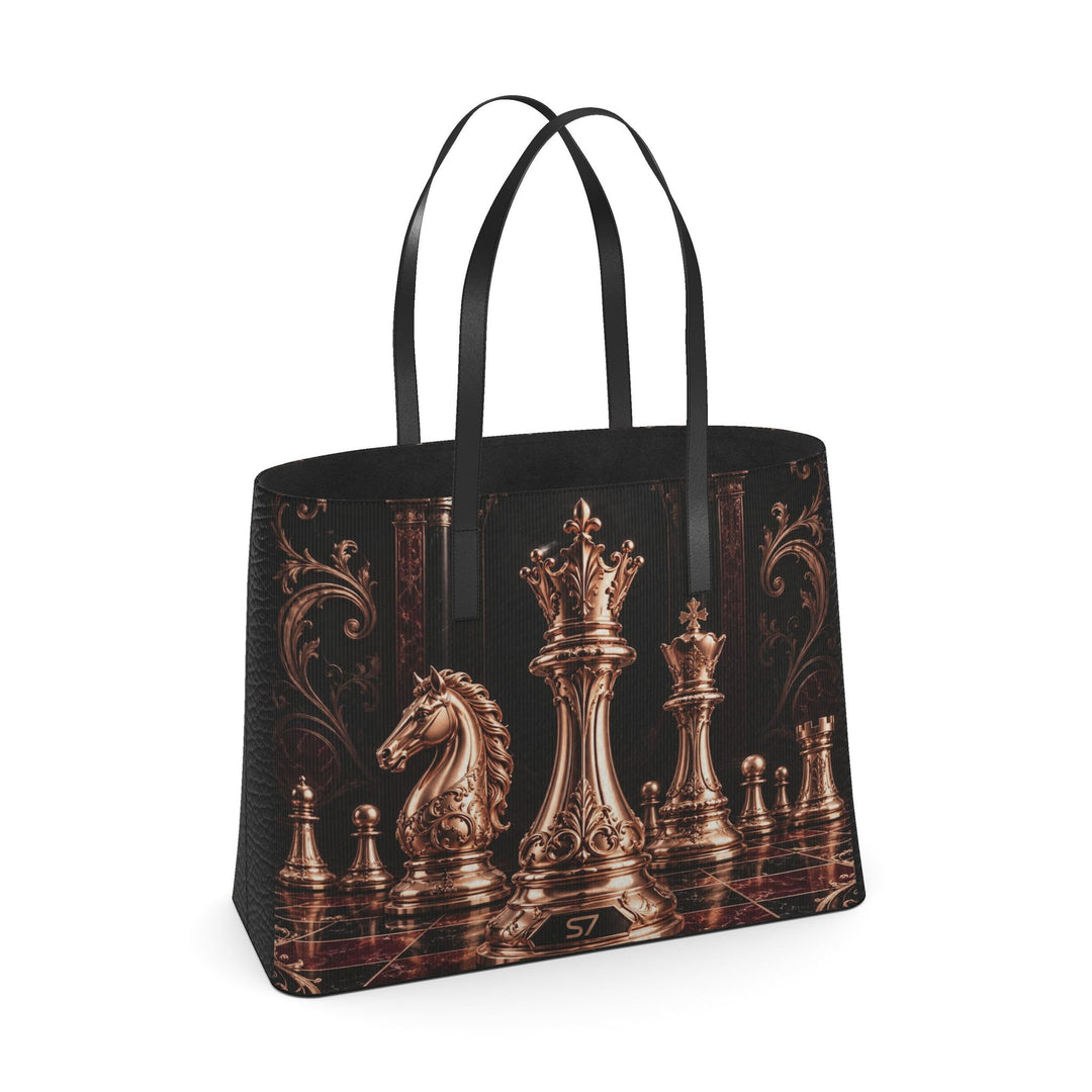 S7 Sovereign black leather tote featuring rose-gold-tone chess pieces, an ornate burgundy chessboard, and black handles.
