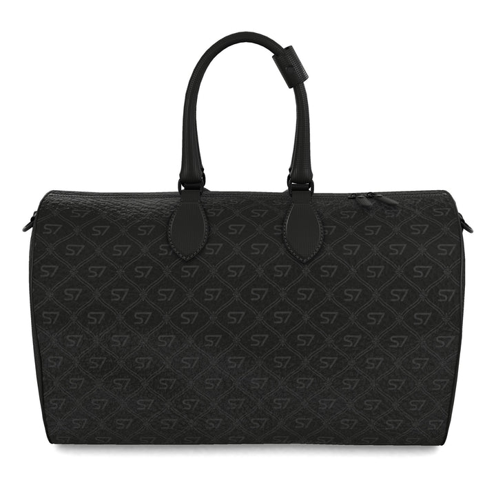 S7 Phantom leather duffle bag featuring near-black charcoal S7 monograms and a tight ornate diamond lattice over a deep-black background.
