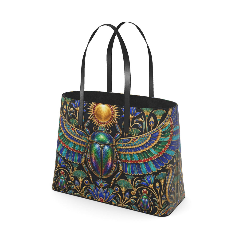 S7 KHEPRI Scarab Royale tote bag with colorful winged scarab artwork, Egyptian-inspired gold detailing, and black handles.