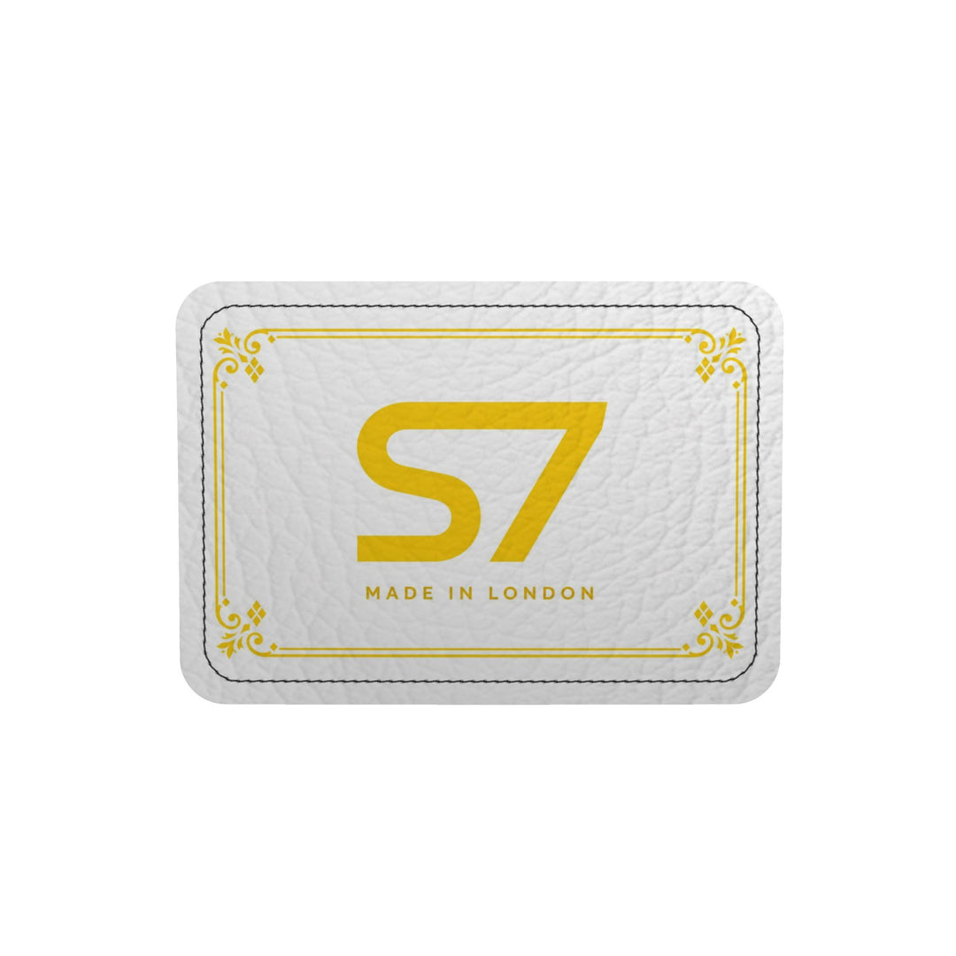 S7 Riviera Soleil duffle bag featuring bright yellow S7 monograms and ornate diamond lattice on a white background.