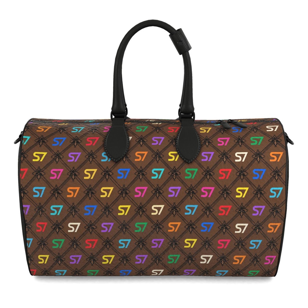 S7 Café Chromatique duffle bag with multicolor S7 monograms, coffee-brown background, black ornate lattice, black side panels, and shoulder strap.