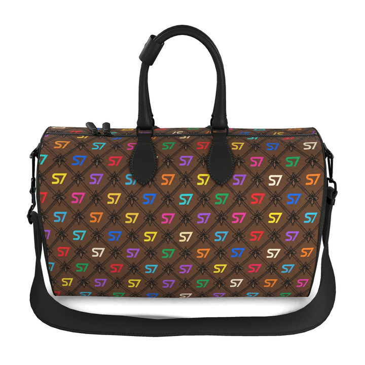 S7 Café Chromatique duffle bag with multicolor S7 monograms, coffee-brown background, black ornate lattice, black side panels, and shoulder strap.