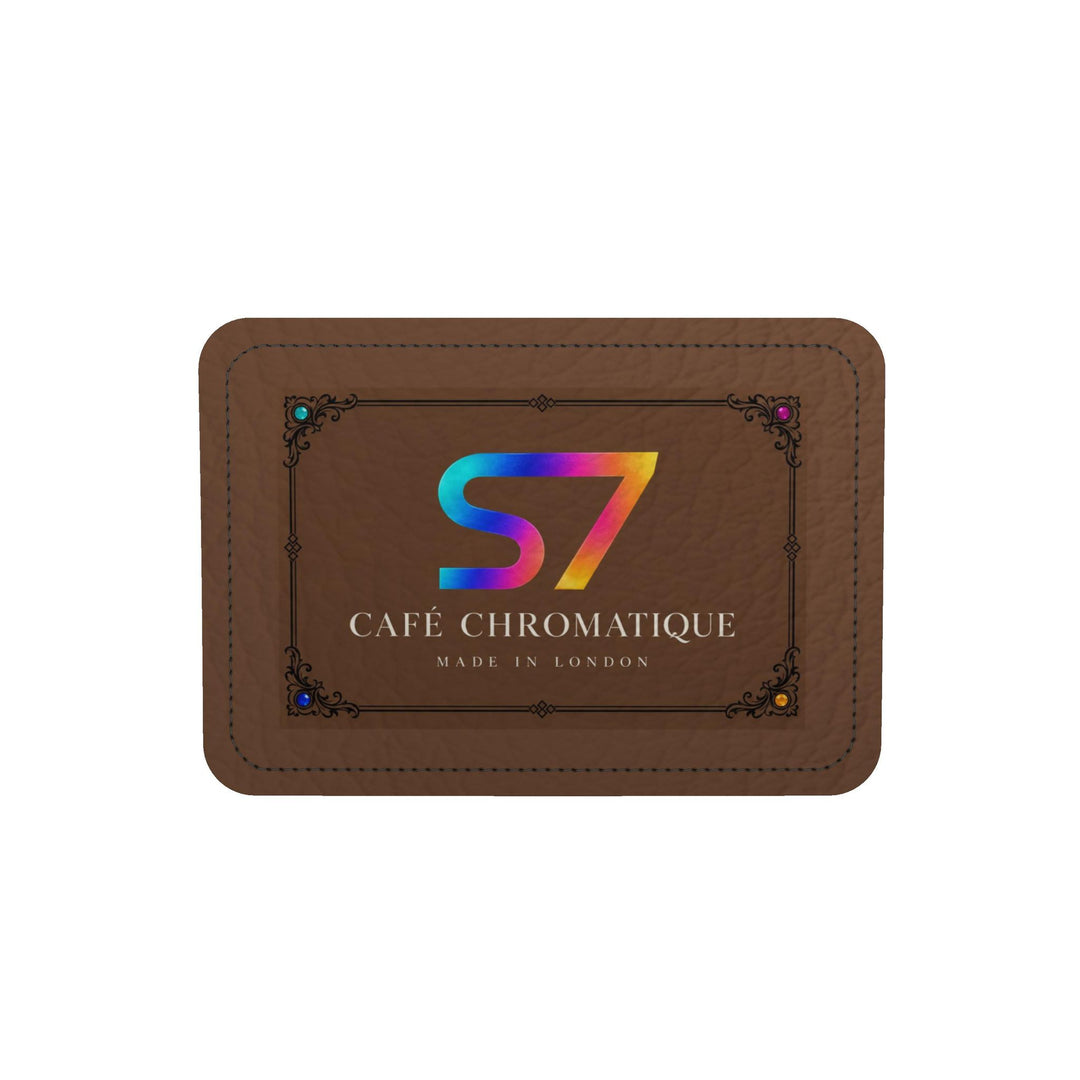 S7 Café Chromatique duffle bag with multicolor S7 monograms, coffee-brown background, black ornate lattice, black side panels, and shoulder strap.