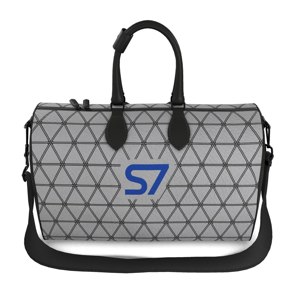 S7 PRISM duffle bag featuring black triangular lattice on a heather-gray background with a single cobalt-blue S7 logo.